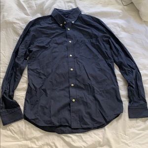 blue long sleeved buttoned shirt